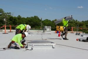 maxwell roofers installing a roof.