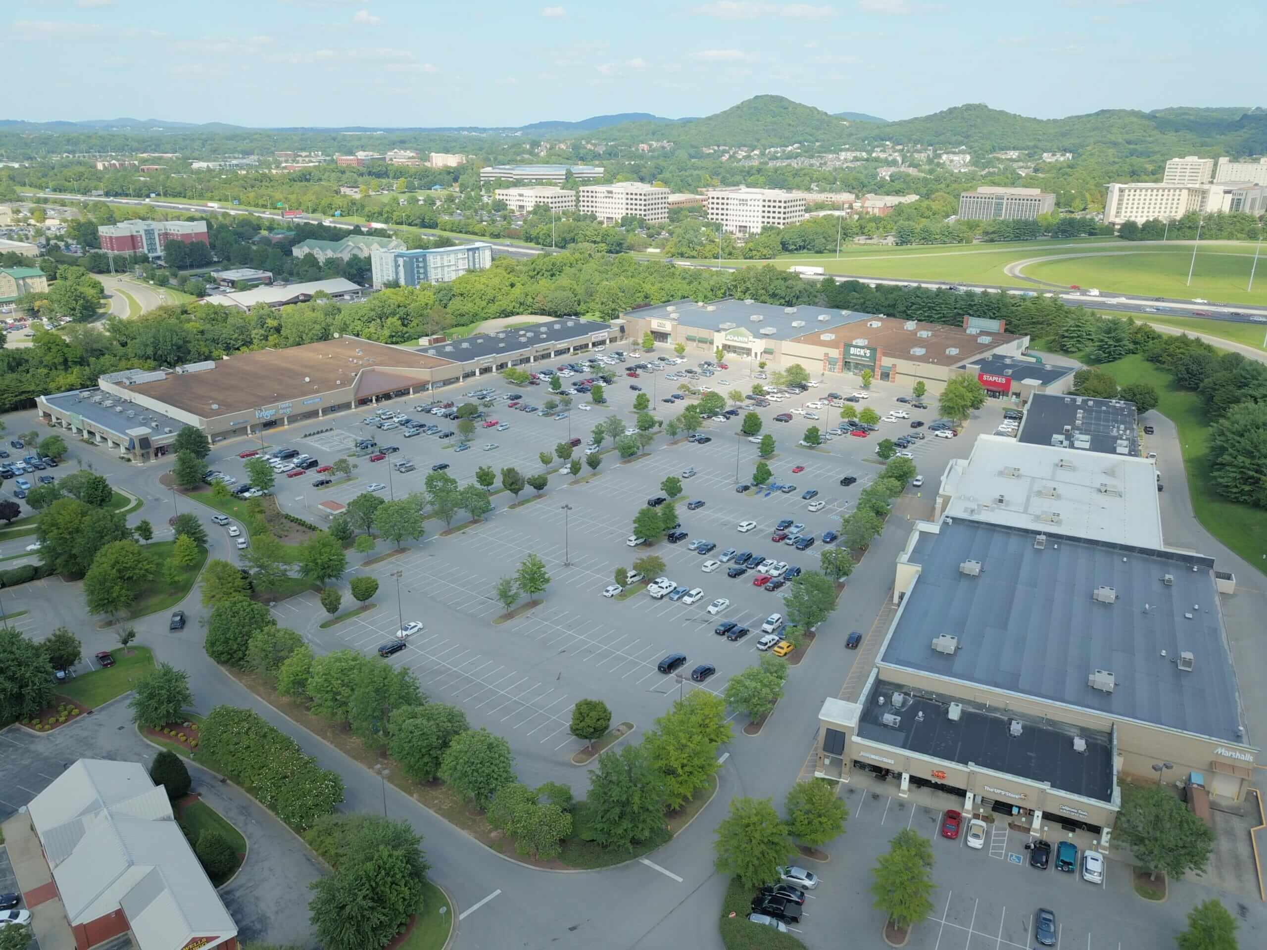 aerial view of commercial retail building roofs