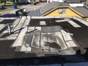 winter damaged commercial roof