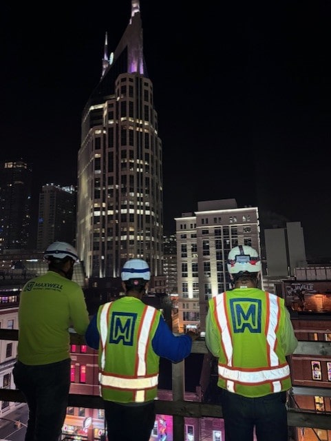 workers at 209 Broadway building construction